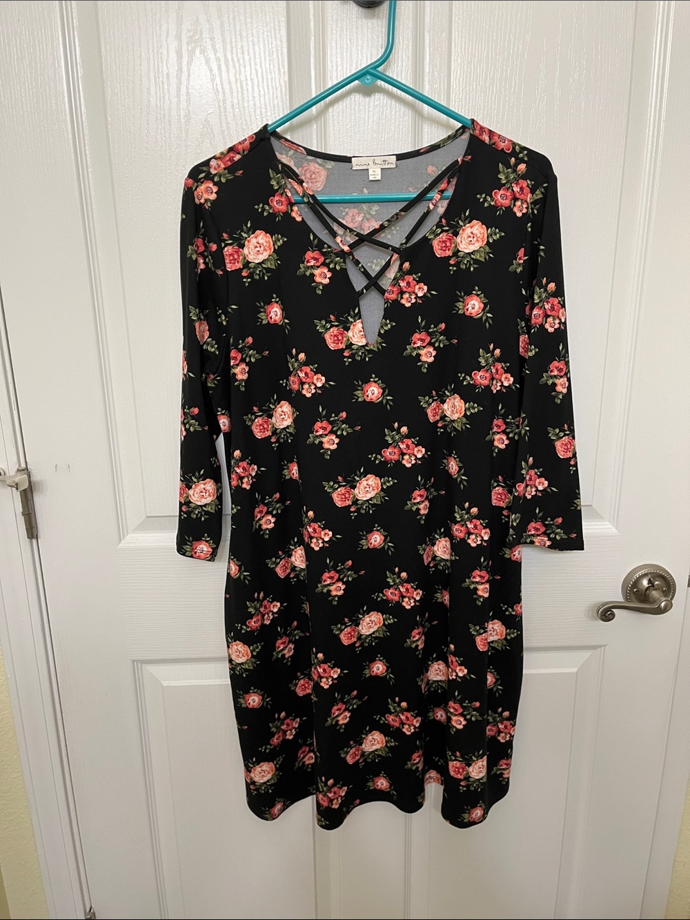 nine britton Black Floral Crisscross Neck Long Sleeve Dress. Mid length.